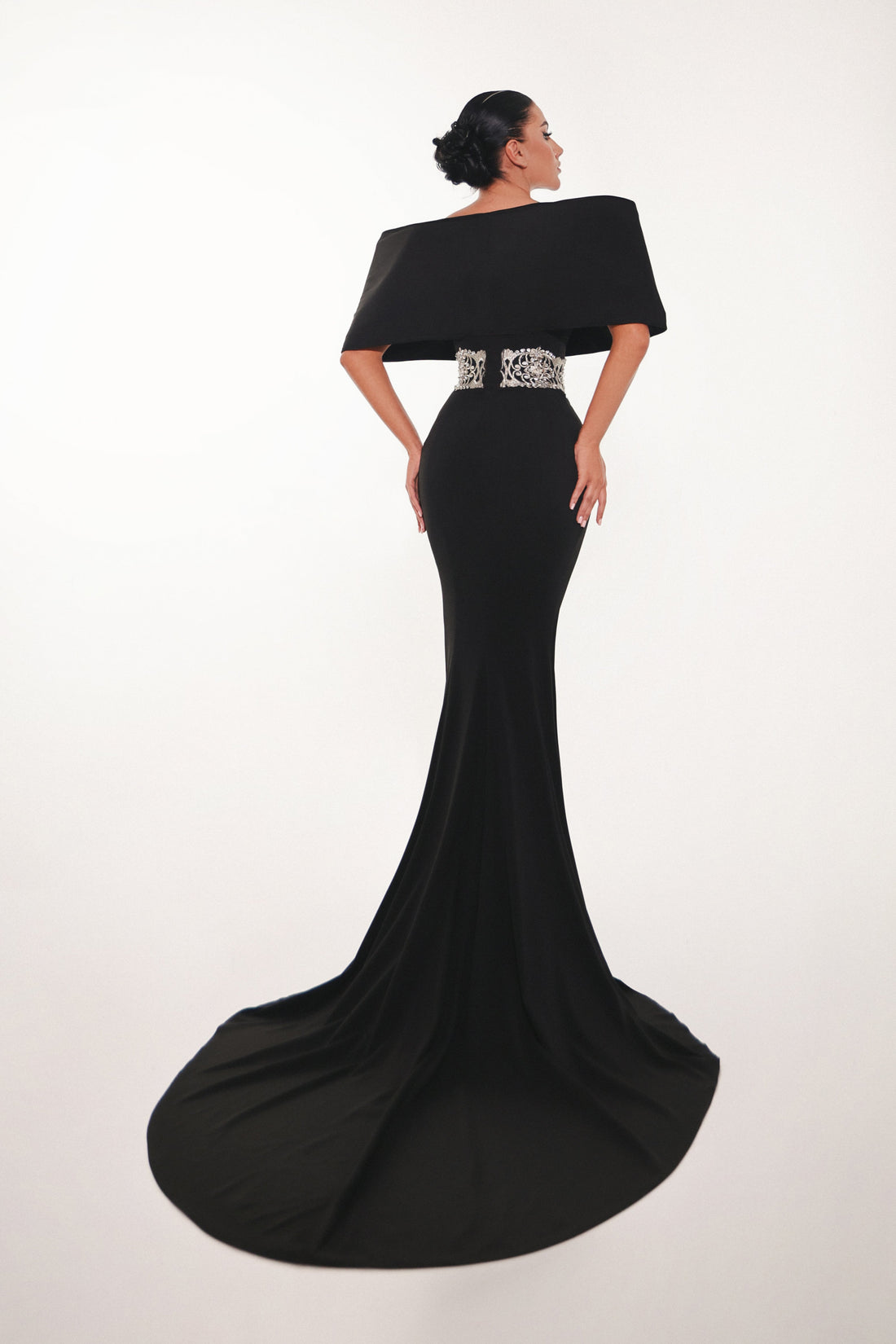 Luxury black couture dress with silver embroidery on bodice and waist, crafted for an elegant