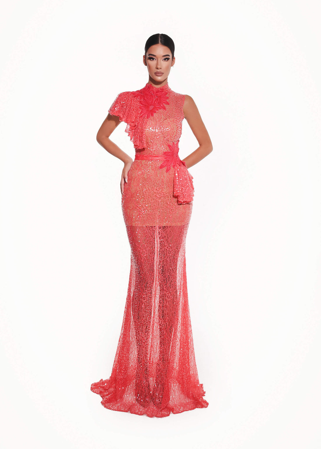 Red evening gown with floral details on a white background