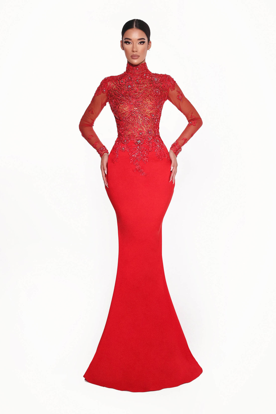 Red evening gown with intricate detailing on a white background