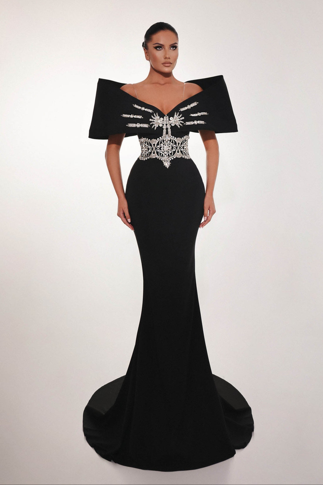 Luxury black couture dress with silver embroidery on the bodice and waist