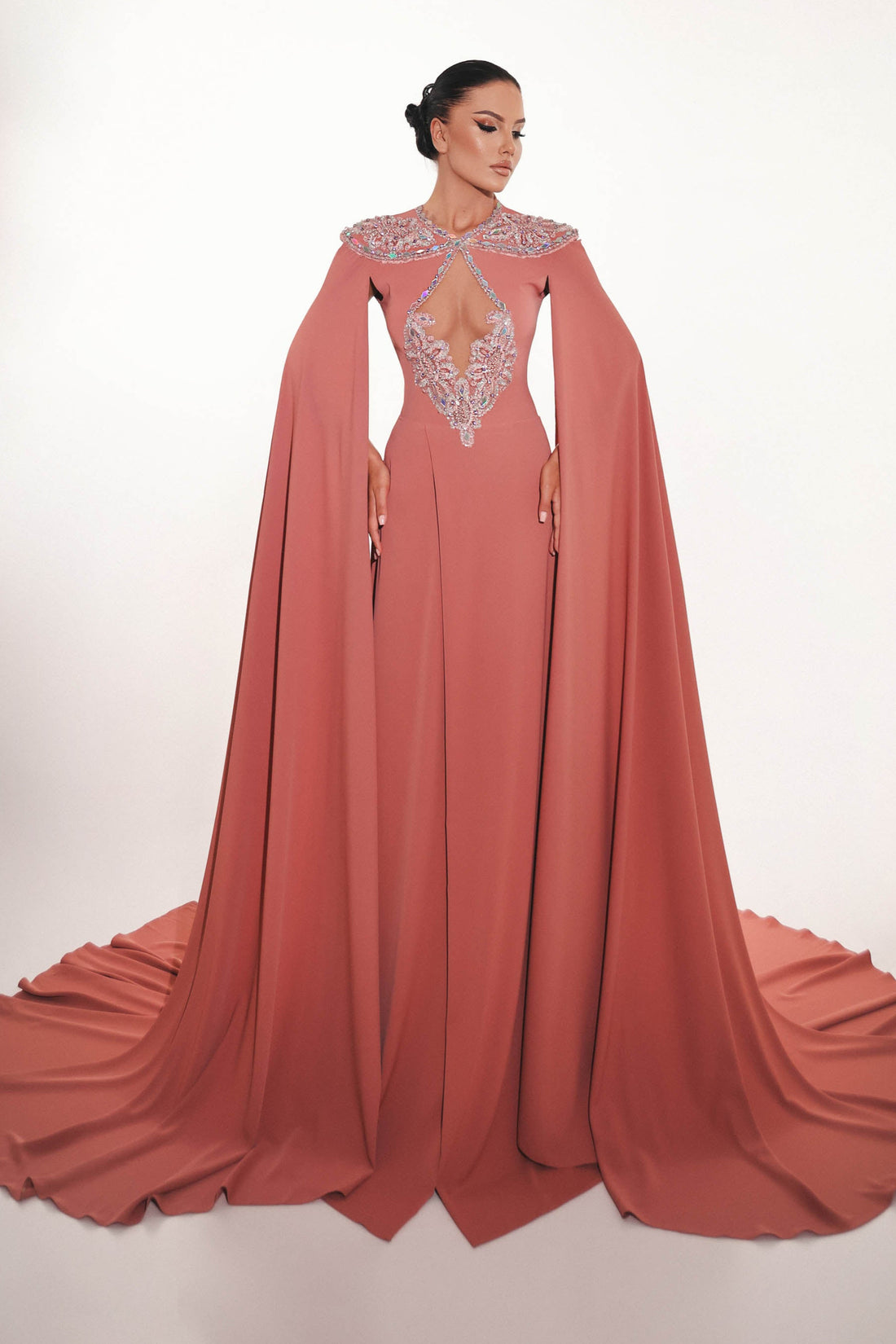 Blush crepe couture gown with cape sleeves – front view