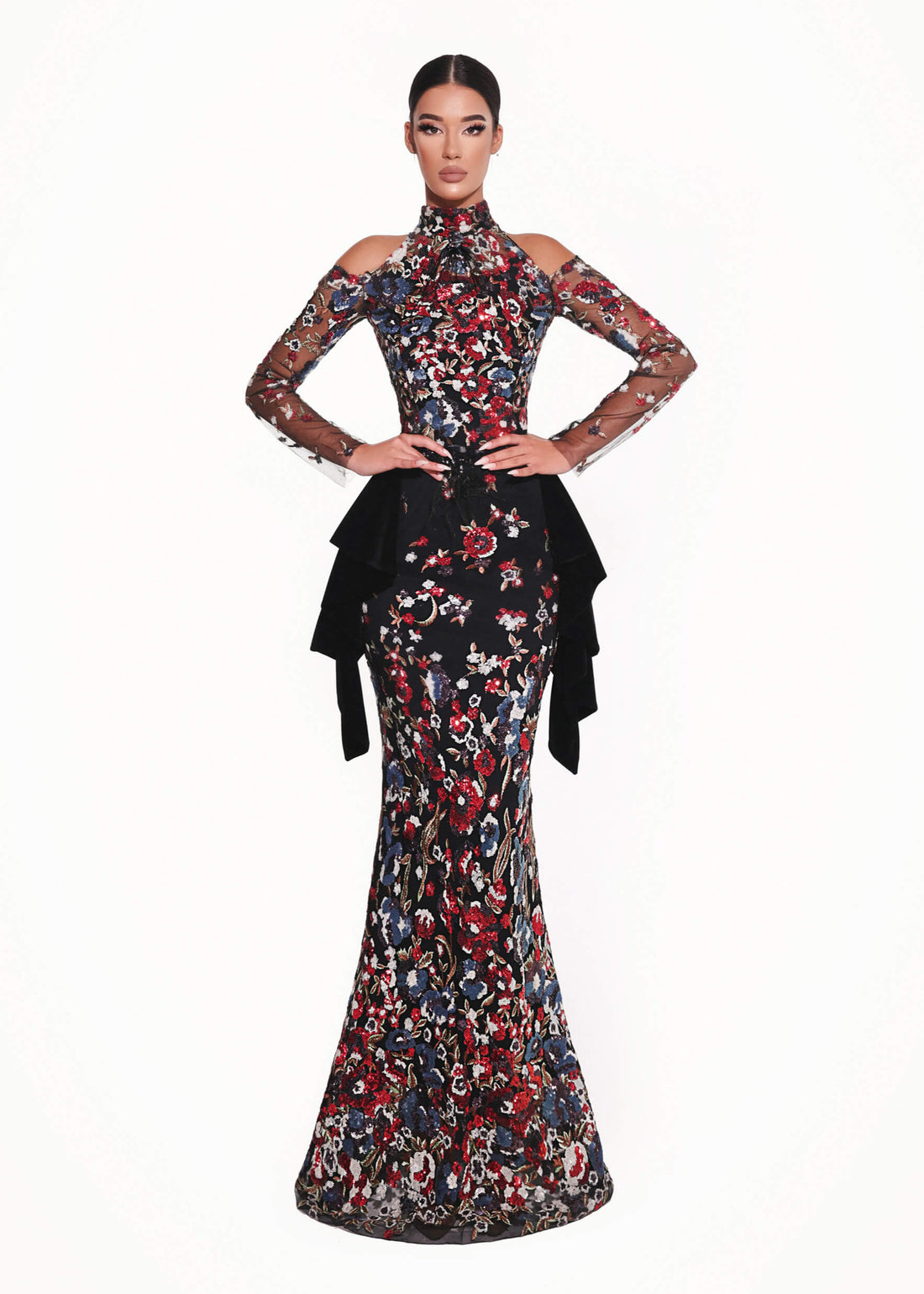 Floral evening gown with sheer sleeves on a white background