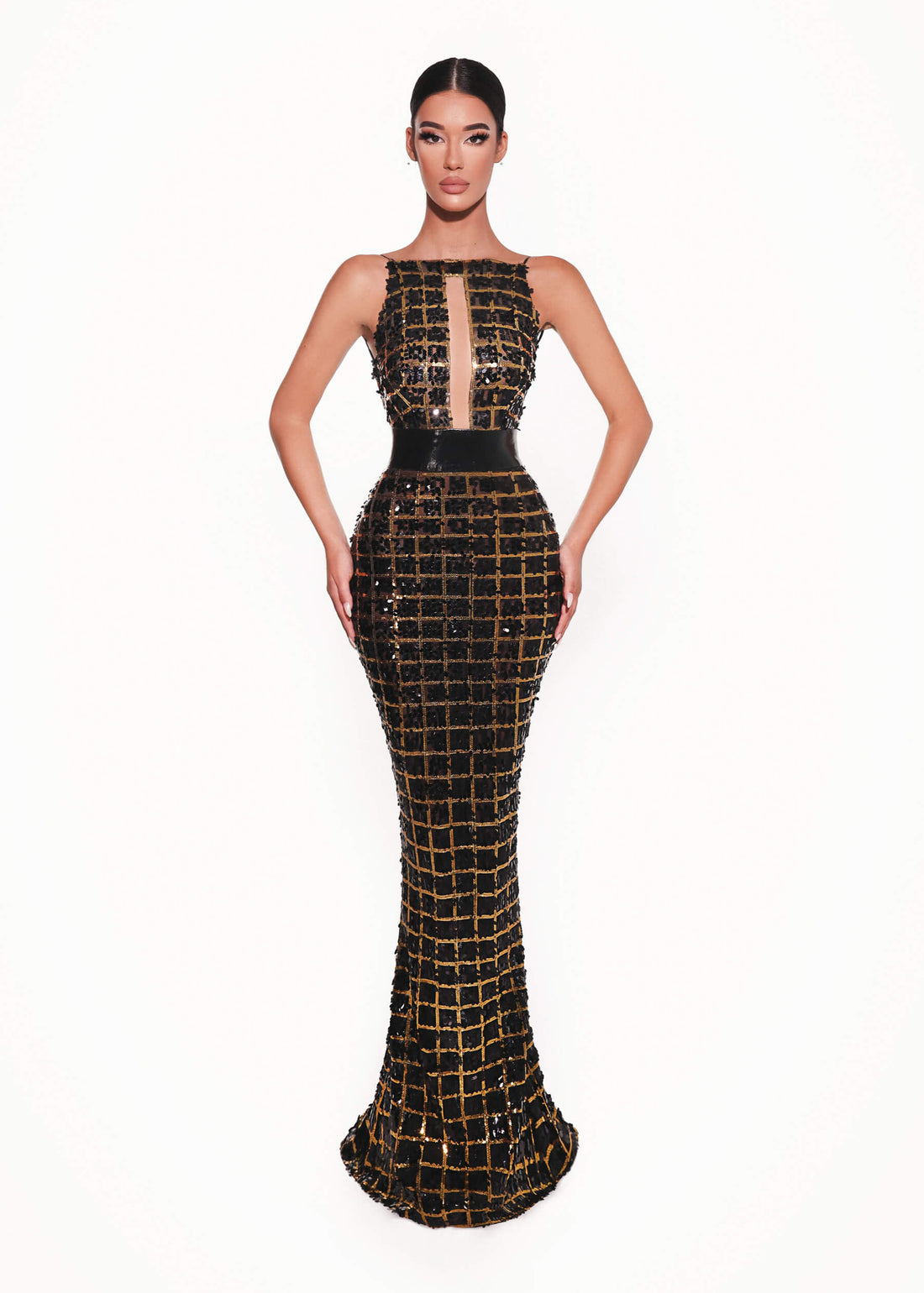 Black and gold embellished mermaid gown with front cutout on white background