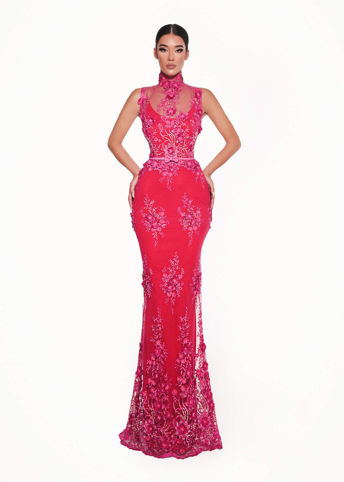 Red evening gown with floral embroidery on a white background