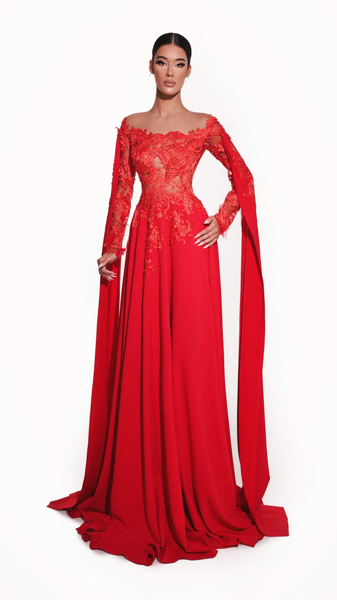 Red evening gown with long sleeves on a white background