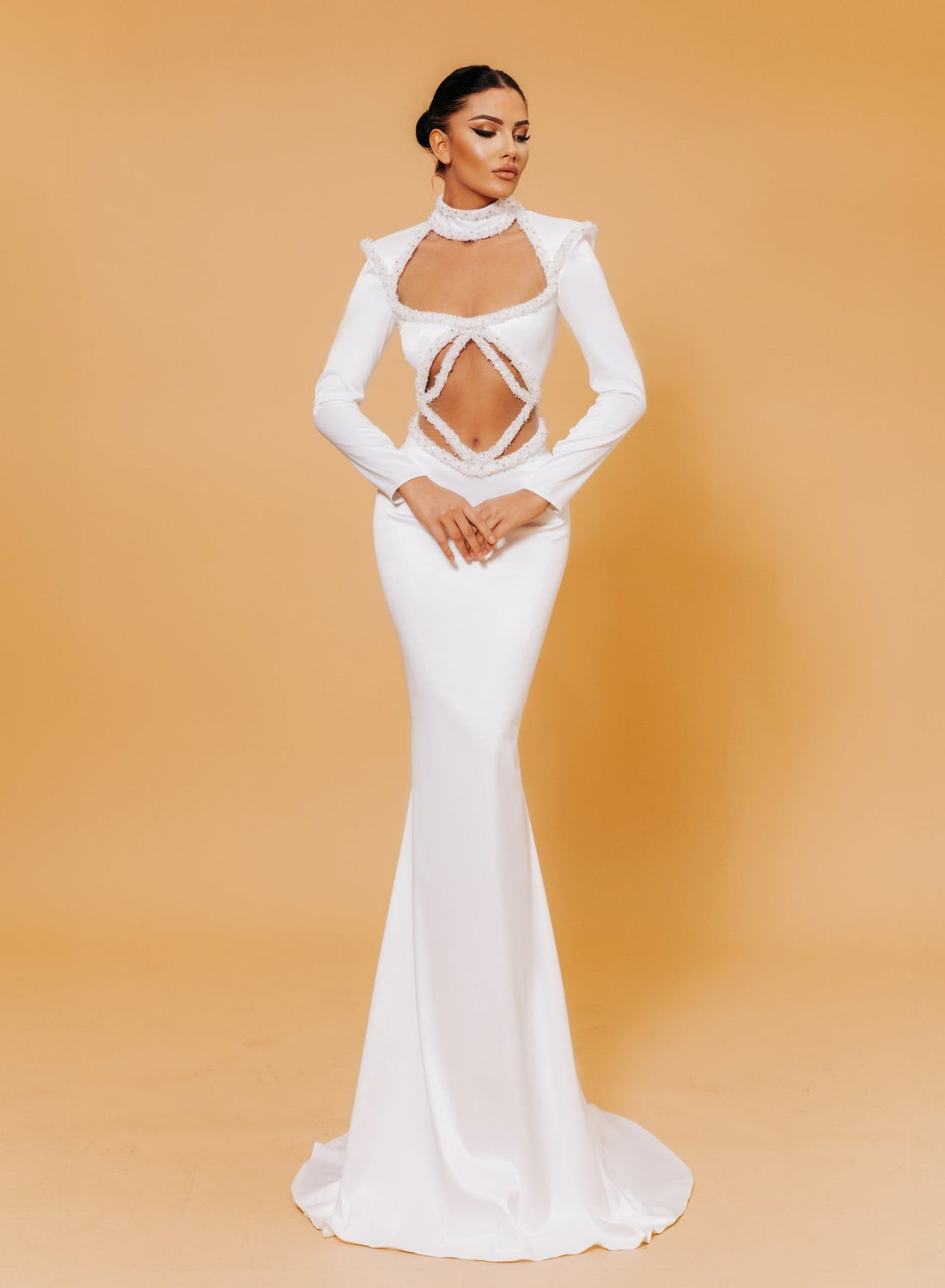 WHITE LONG SLEEVE CUTOUT MERMAID DRESS WITH PEARL EMBELLISHMENTS KUJTA & MERI WHITE LONG SLEEVE CUTOUT MERMAID DRESS WITH PEARL EMBELLISHMENTS KUJTA & MERI